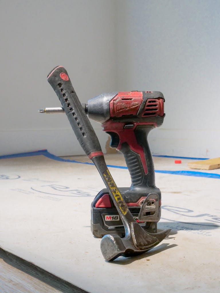 Milwaukee M18 Fuel 1/2-inch drill driver and hammer on construction floor